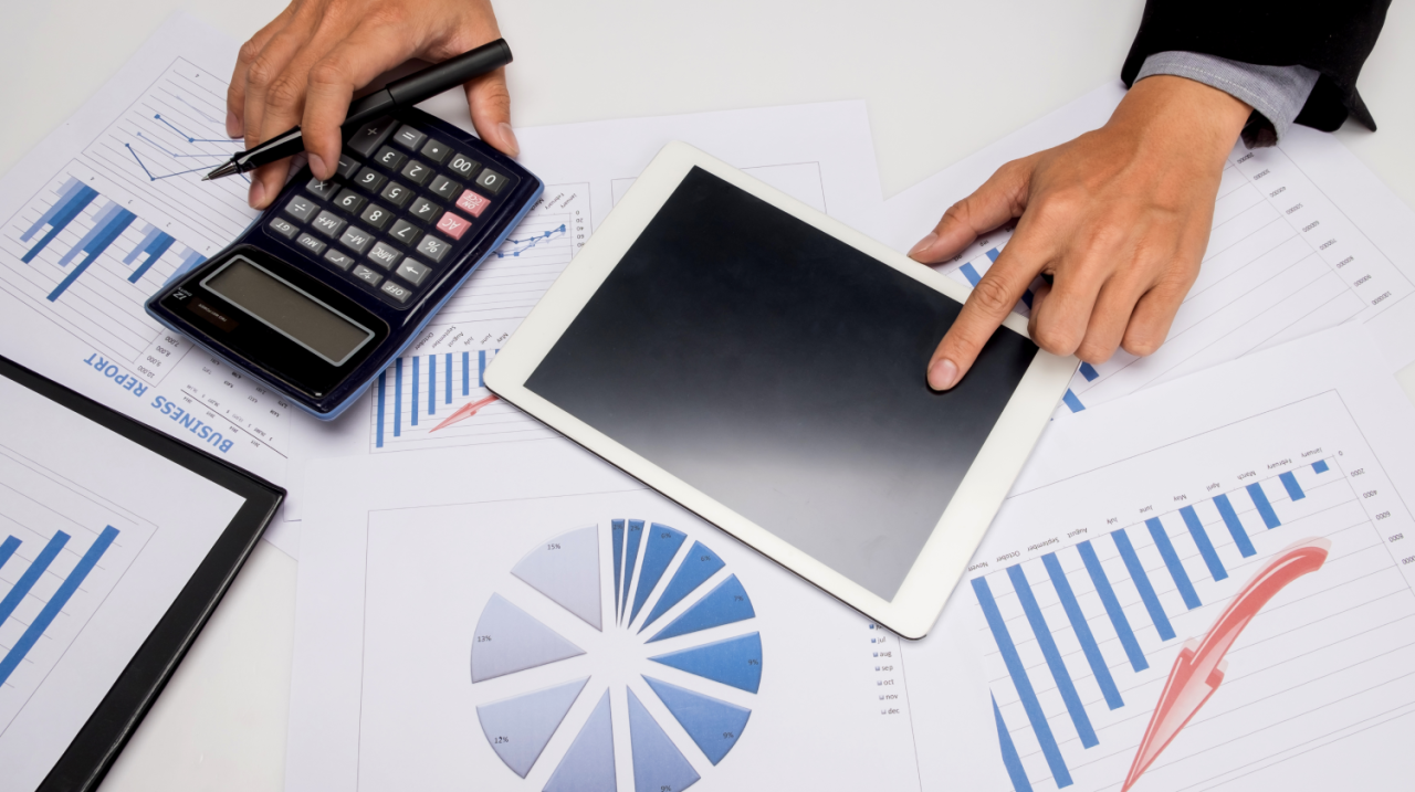 business-documents-office-table-with-smart-phone-digital-tablet-man-working-background
