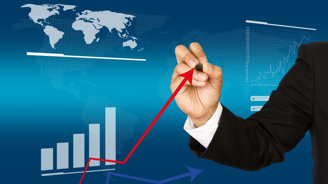 Businessman hand write business graph
