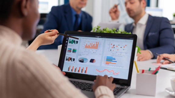 multi-ethnic-business-team-sitting-table-office-center-speaking-about-project-meeting-broadroom